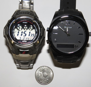 Watches shown with a quarter as reference